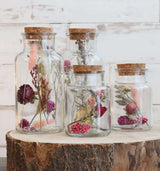 Flacon en verre avec 2 fleurs séchées différentes Ø7cm (12 pièces)